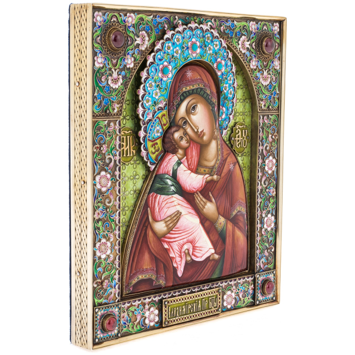 Silver icon with the inscription "Mother of God of Vladimir"