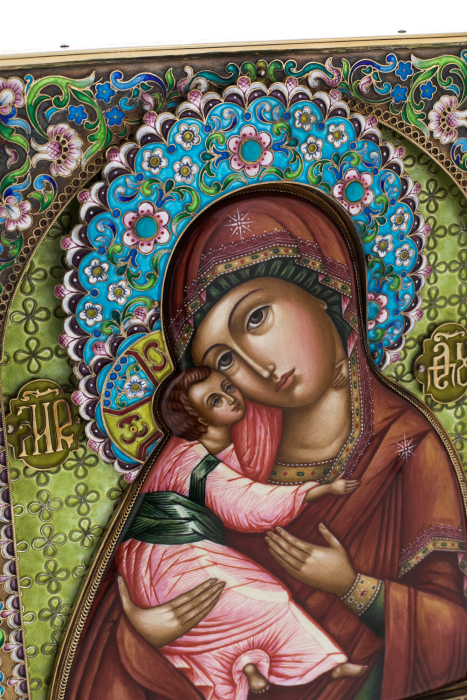 Silver icon with the inscription "Mother of God of Vladimir"