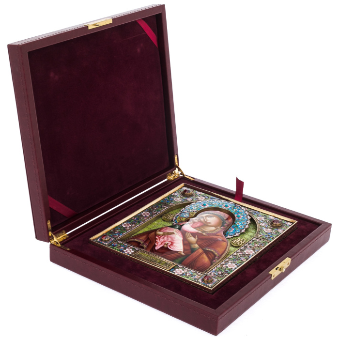 Silver icon with the inscription "Mother of God of Vladimir"
