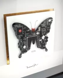 Damir Krivenko's painting "Butterfly" in a black frame