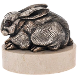 Bronze sculpture "Rabbit lying" on marble