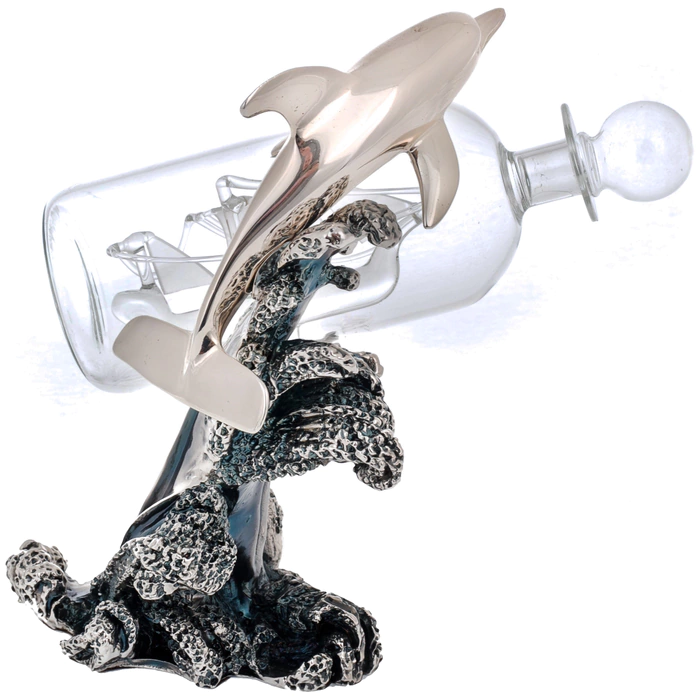 Statuette "Dolphin with a bottle" with silver coating