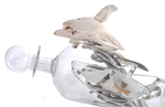 Statuette "Dolphin with a bottle" with silver coating