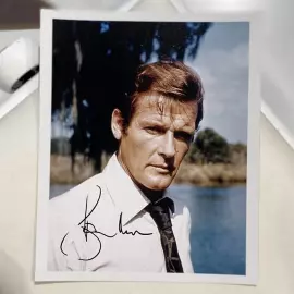 Signed photo by Roger Moore