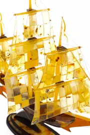 The model of the ship made of amber "Corvette"