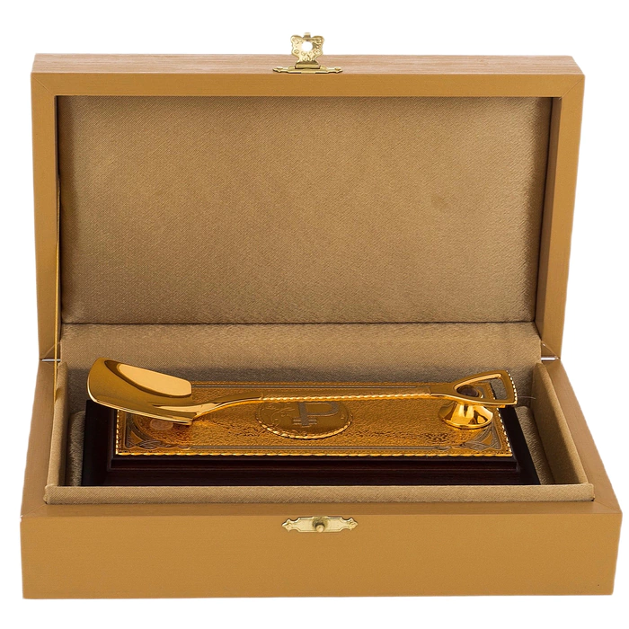 Souvenir "Money shovel" on a stand with a stone, Zlatoust