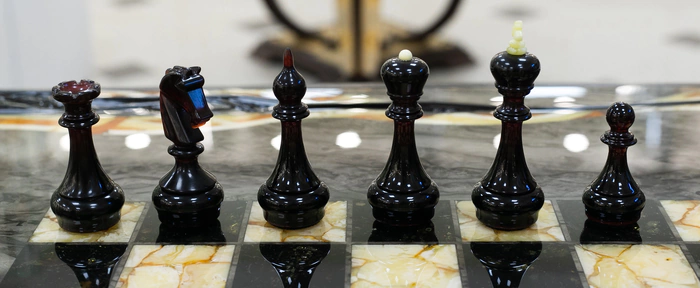 Chess table made of Karelian birch and amber "Infiniti"