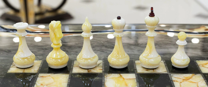 Chess table made of Karelian birch and amber "Infiniti"