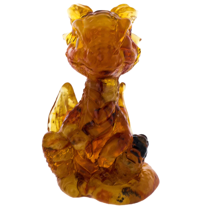 Amber sculpture "Dragon sitting", light