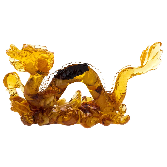 Amber sculpture "Dragon with a ball", light