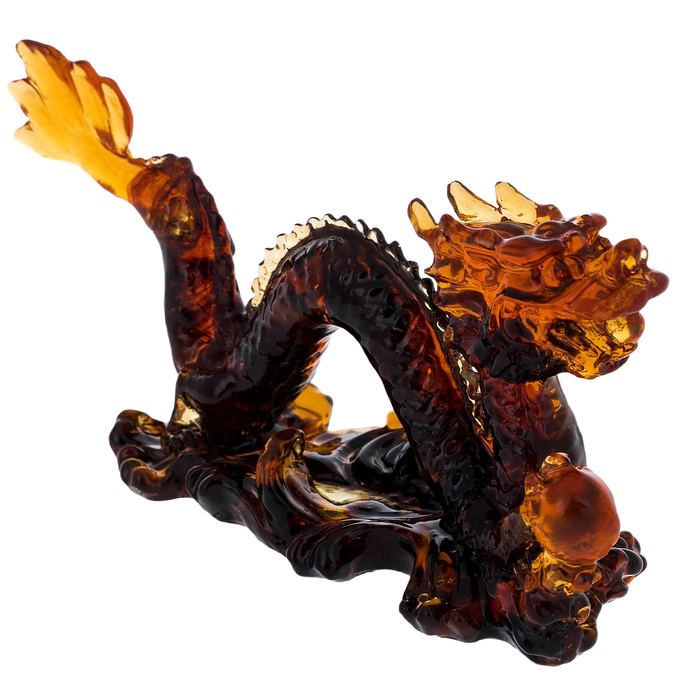 Amber sculpture "Dragon with a ball", dark