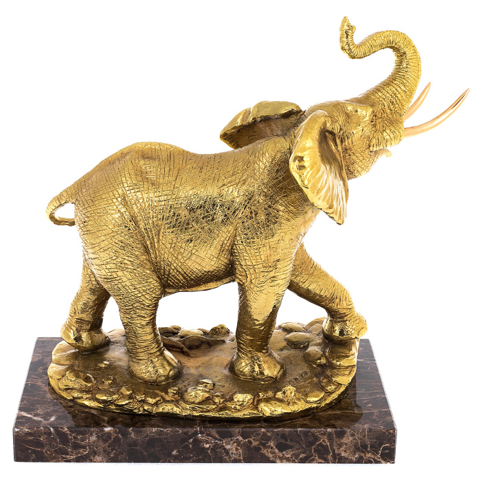 Golden elephant sculpture with gilding