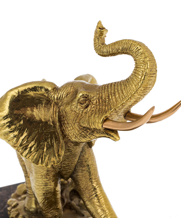 Golden elephant sculpture with gilding