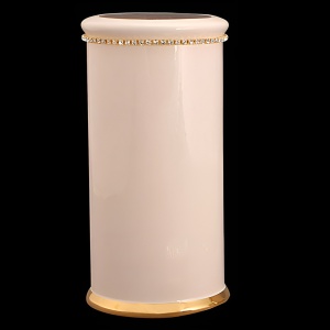 A stand for a toilet brush with gold and Swarovski crystals