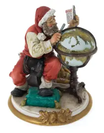 Статуэтка "Санта Клаус с глобусом" Статуэтка "Санта Клаус с глобусом"