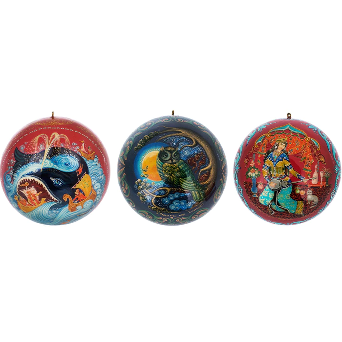 A set of wooden Christmas tree balls "Palekh fairy tales" in a gift box