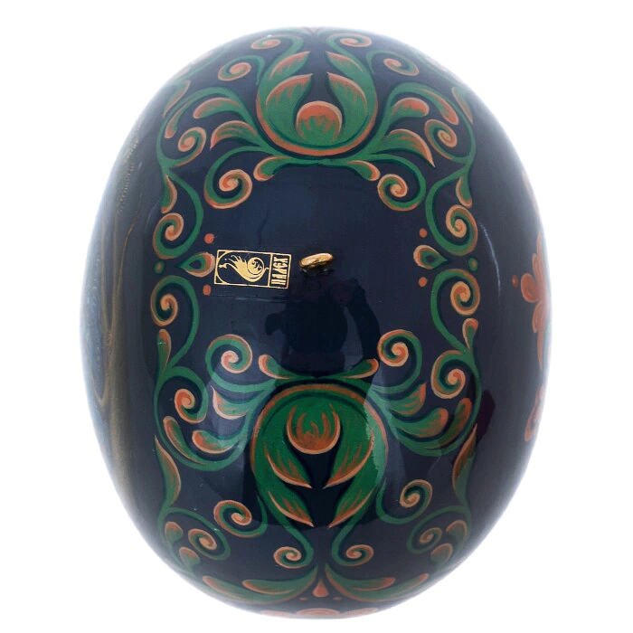A set of wooden Christmas tree balls "Palekh fairy tales" in a gift box