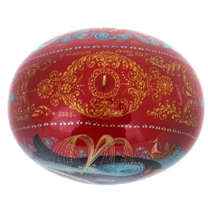 A set of wooden Christmas tree balls "Palekh fairy tales" in a gift box