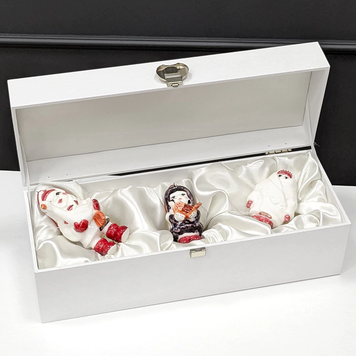A set of porcelain Christmas tree toys "Girls" in a gift box