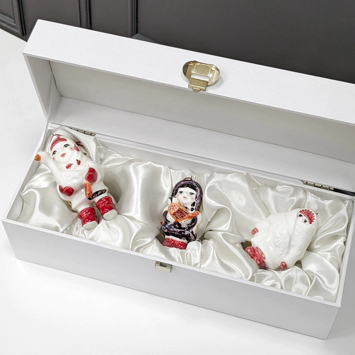 A set of porcelain Christmas tree toys "Girls" in a gift box