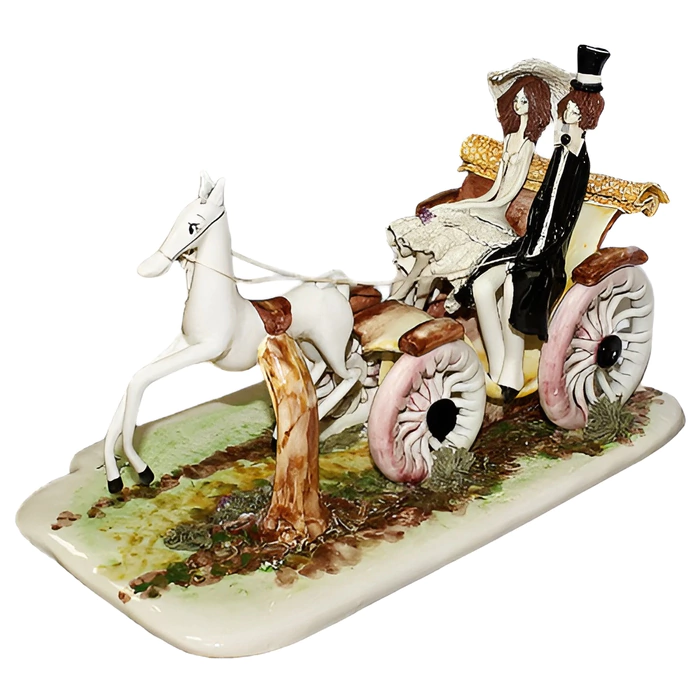 Statuette "Lady and gentleman in a stroller"
