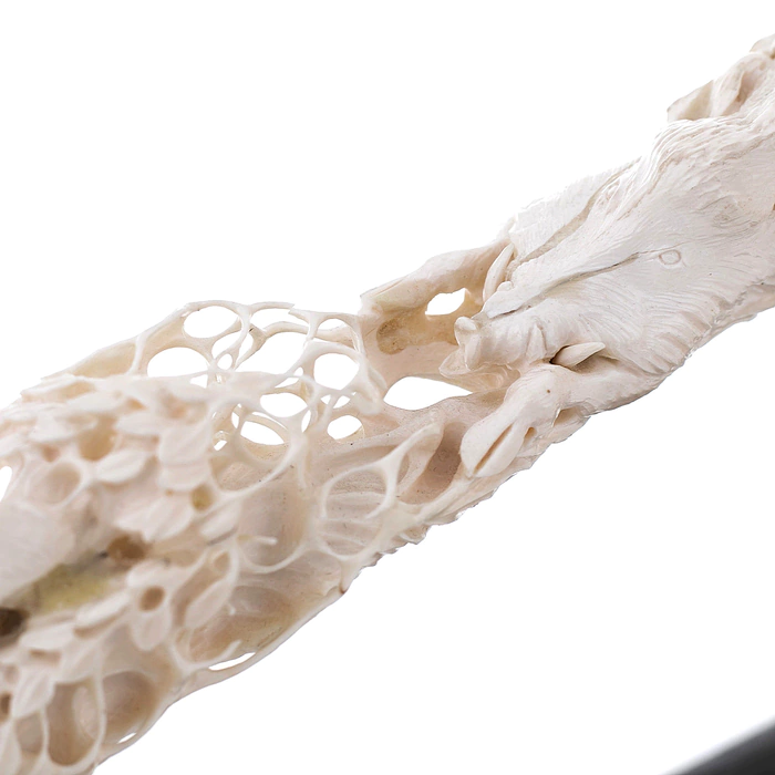 Composition of mammoth tusk and stained oak "Hunting of wolves"