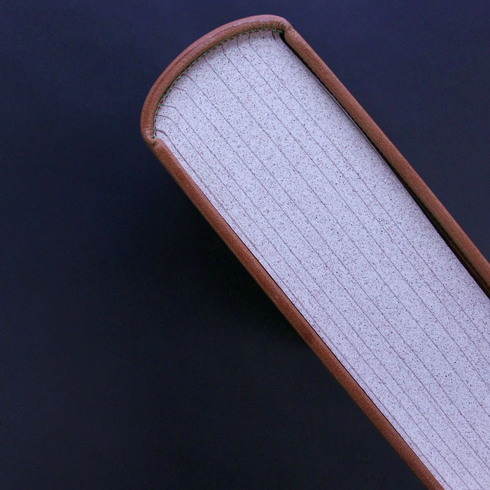 The leather-bound book "Mathematical principles of natural Philosophy" by Newton I.