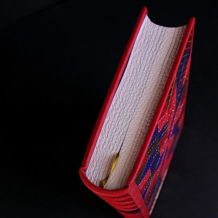 The leather-bound book "Yuletide stories" by F. Nefedov.