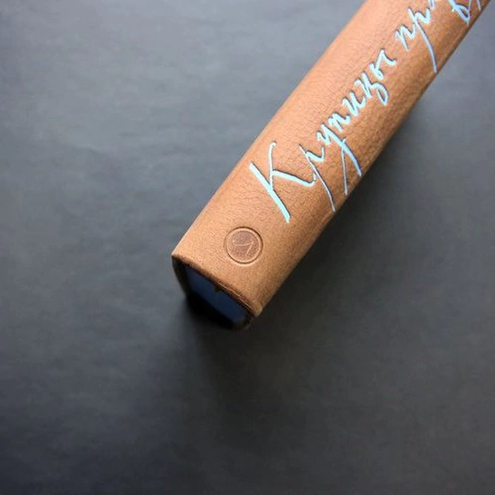 The leather-bound book "Grains of Truth" by K. Paustovsky