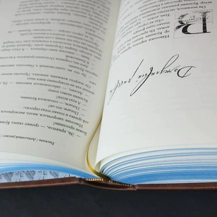 The leather-bound book "Grains of Truth" by K. Paustovsky