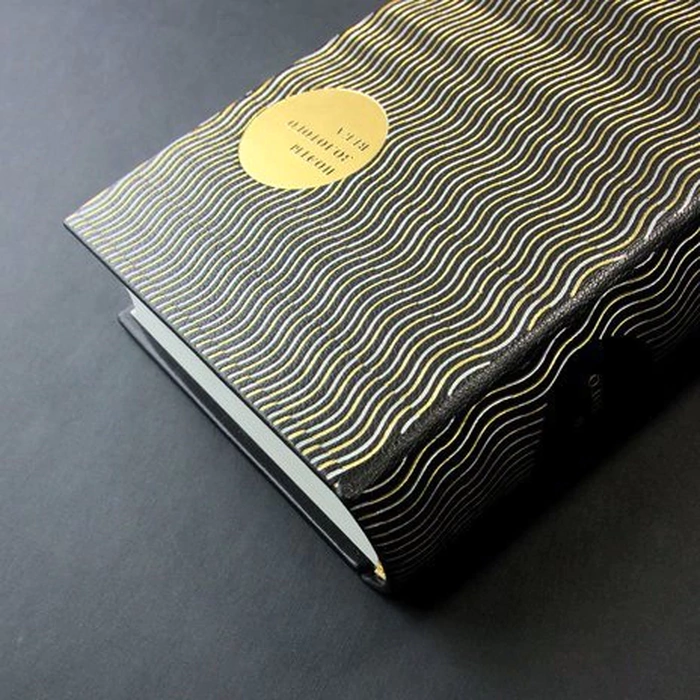 The leather-bound book "Poets of the Golden Age"