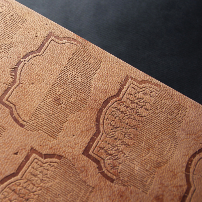 The leather-bound book "The Prophet" by Gibran H.