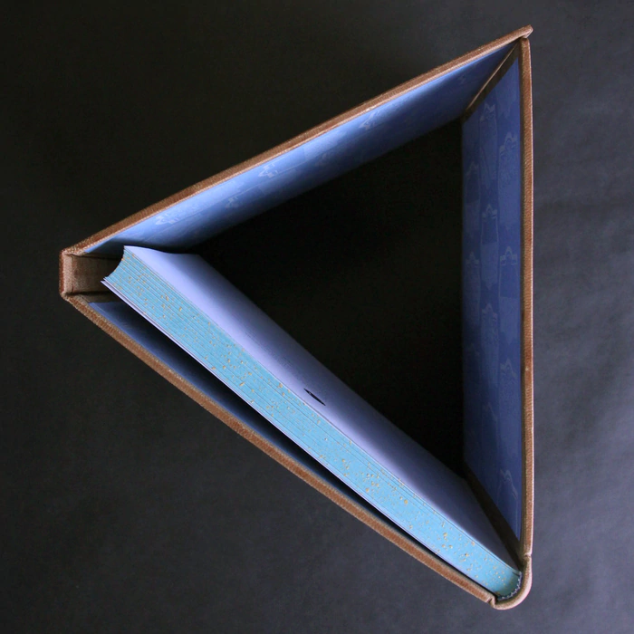 The leather-bound book "The Prophet" by Gibran H.