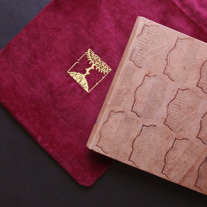 The leather-bound book "The Prophet" by Gibran H.