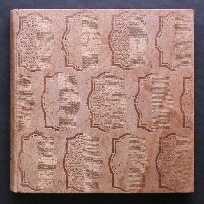The leather-bound book "The Prophet" by Gibran H.