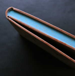 The leather-bound book "The Prophet" by Gibran H.