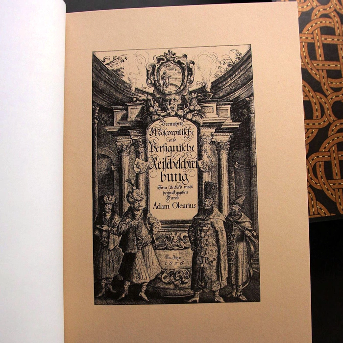 A leather-bound book "Description of a trip to Muscovy and through Muscovy to Persia and back" by Olearius A.
