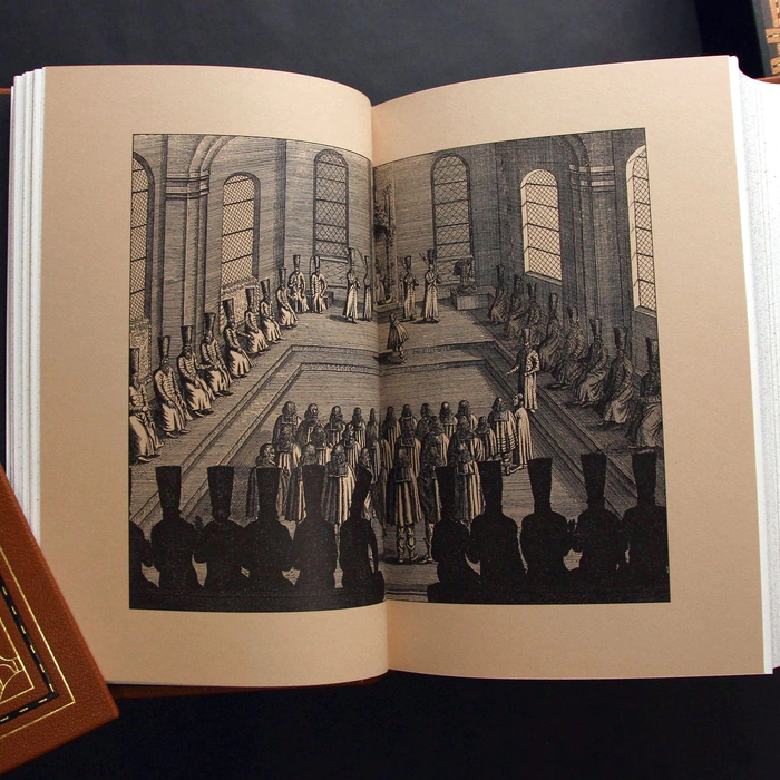 A leather-bound book "Description of a trip to Muscovy and through Muscovy to Persia and back" by Olearius A.
