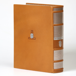 The leather-bound book "Cooking edition 1955."