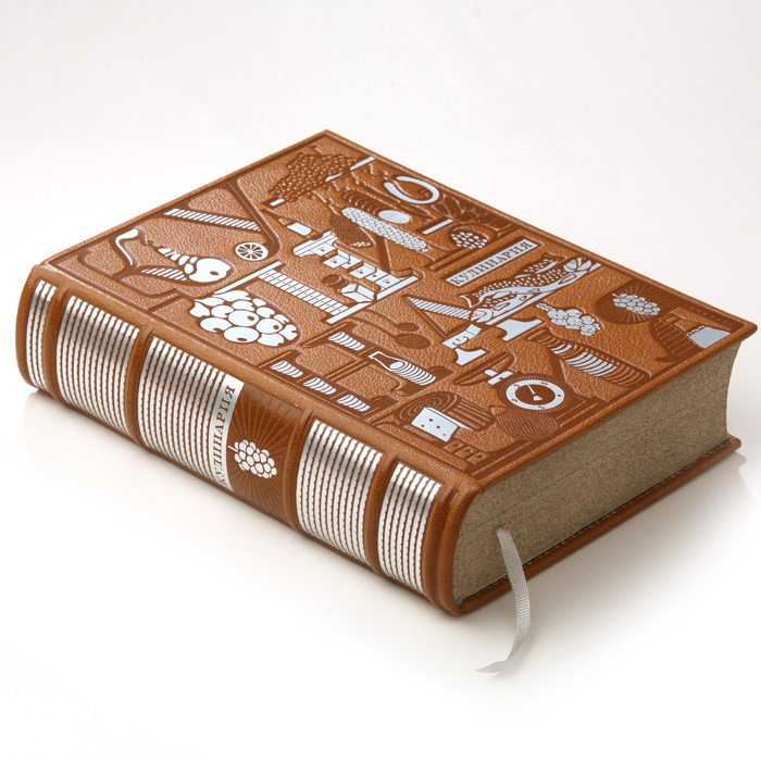 The leather-bound book "Cooking edition 1955."