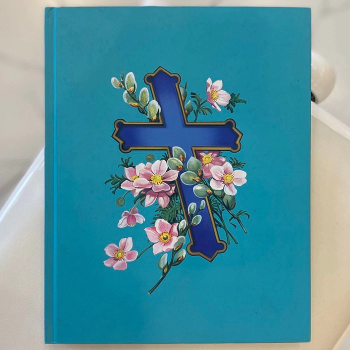 A book with a handwritten wish, drawing and autograph by artist Damien Hirst