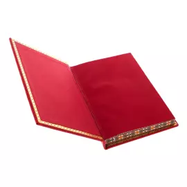 The leather-bound book "Putin. Quotes and aphorisms" on a rotating platform