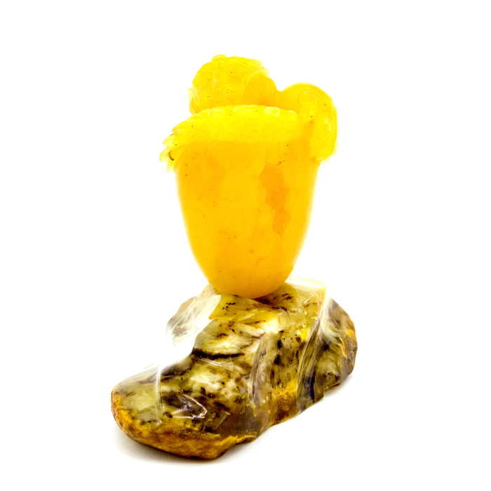 Souvenir made of amber "Dragon on a stone"