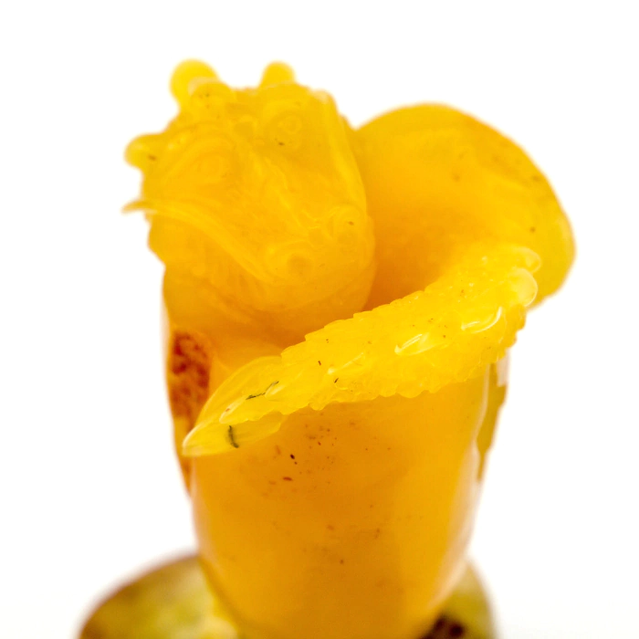 Souvenir made of amber "Dragon on a stone"