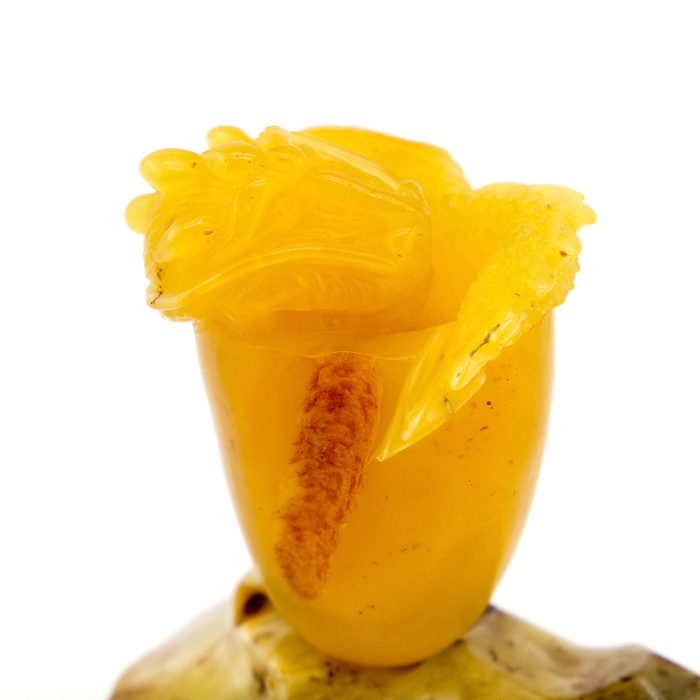 Souvenir made of amber "Dragon on a stone"