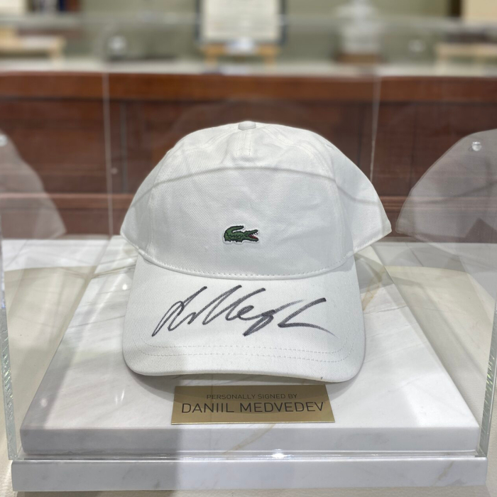 Tennis player Daniil Medvedev's cap, white marble