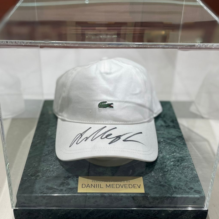 Tennis player Daniil Medvedev's cap, green marble