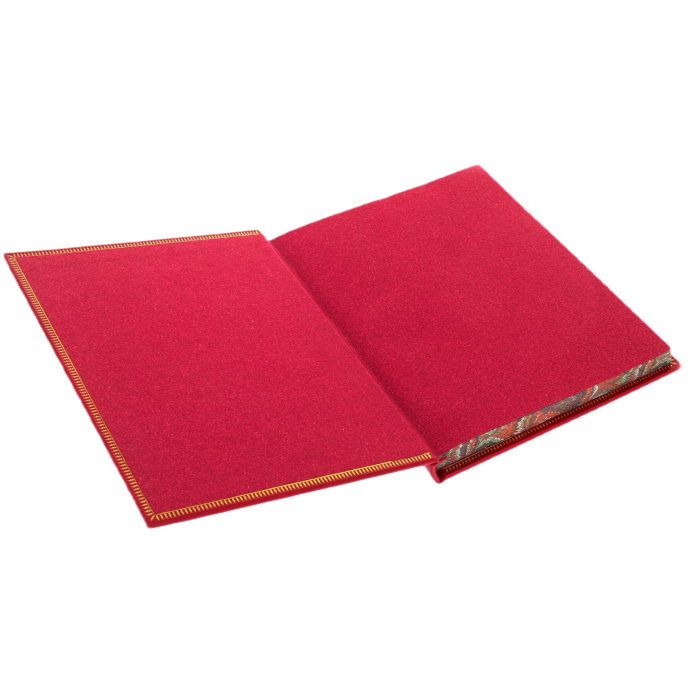 The leather-bound book by Mark Twain "The Adventures of Huckleberry Finn"