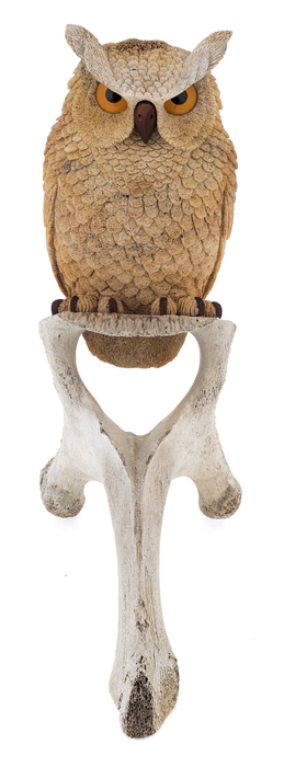 The sculpture of the whale bone "Owl" is large