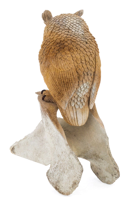 The sculpture of the whale bone "Owl" is large